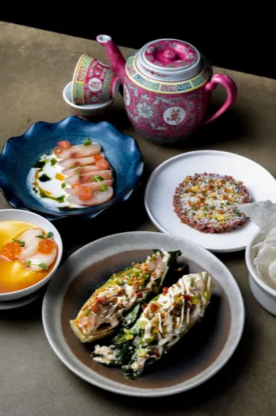 Plated tasting selection at Torafuku, a Michelin-recommended Asian restaurant in Vancouver